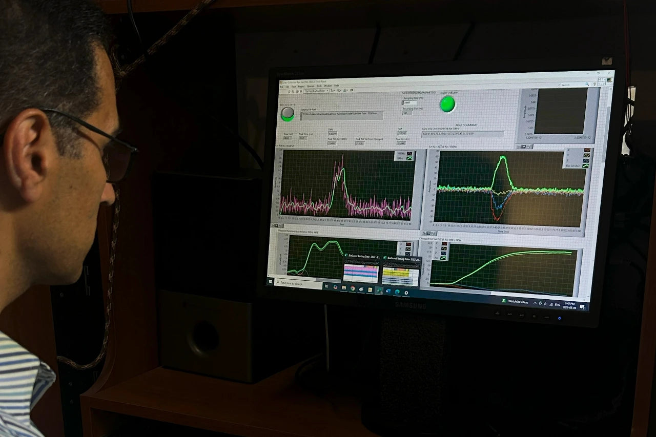 Dr. Daniel Abram, founder of PIKIO LABS, is analyzing the impact test data.