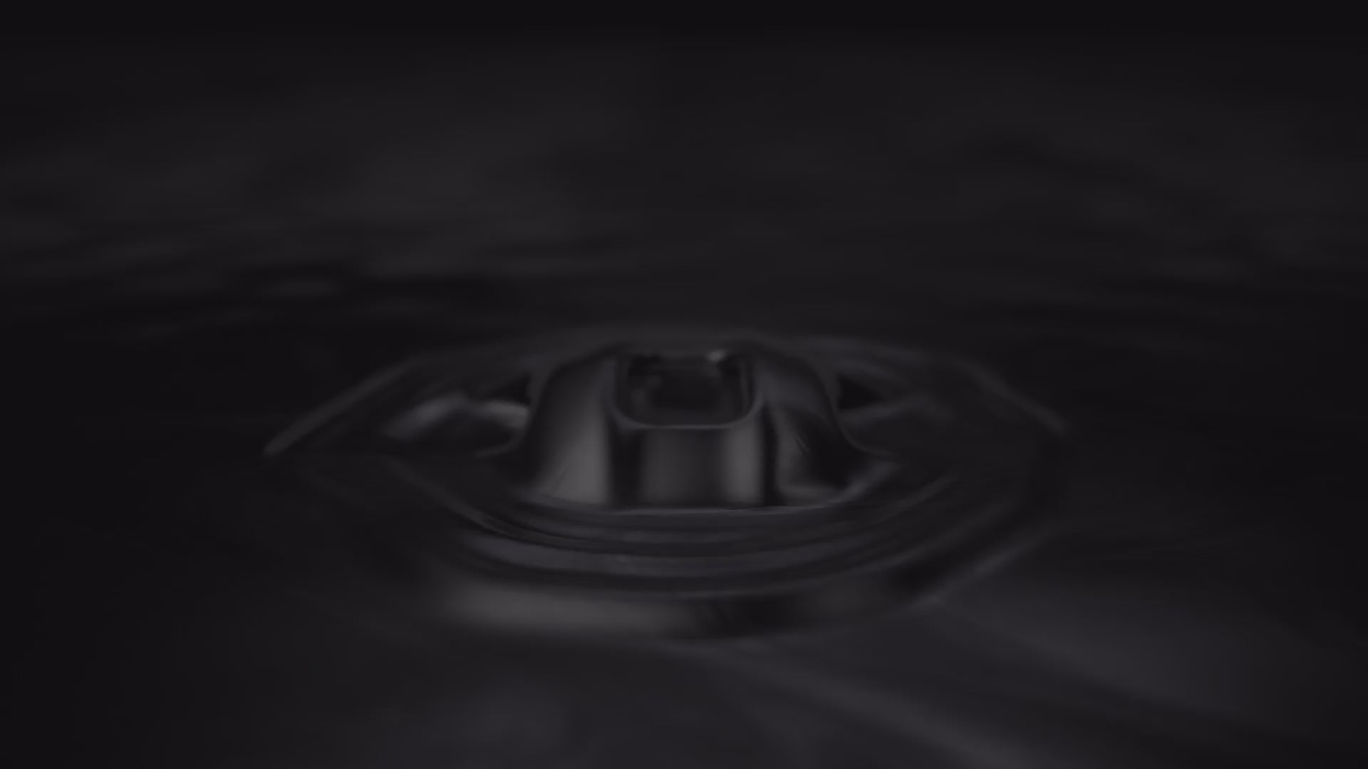 Load video: PIKIO Si helmet emerging from liquid metal, revealing a shattered metallic shell and rotating X-ray view of its internal structure.